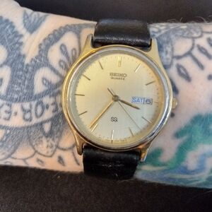 Seiko SQ Gold and Black Quartz Day Date Watch